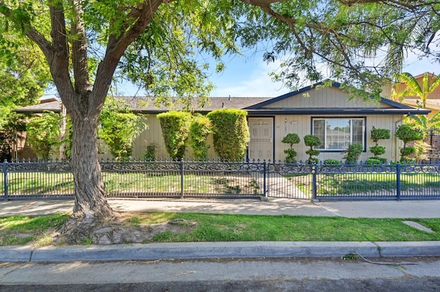 4311 N Emerson Ave, Fresno, CA 93705 - ranch-style home with a fenced front yard