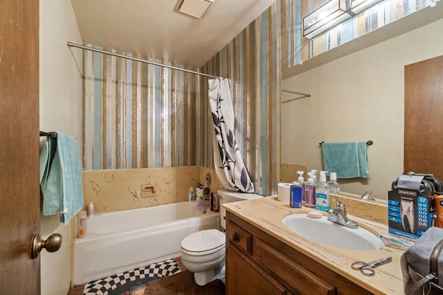 4311 N Emerson Ave, Fresno, CA 93705 - bathroom with wallpapered walls, toilet, vanity, and shower / bath combination with curtain