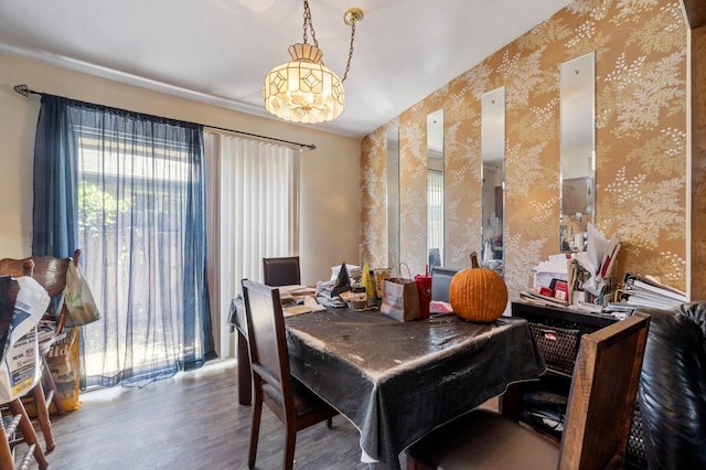 4311 N Emerson Ave, Fresno, CA 93705 - dining area featuring a chandelier, wood finished floors, and wallpapered walls