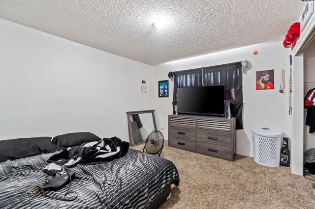 4311 N Emerson Ave, Fresno, CA 93705 - carpeted bedroom with a textured ceiling