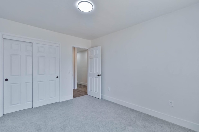 227 E Pine Ave, Fresno, CA 93728 - unfurnished bedroom with carpet floors, baseboards, and a closet