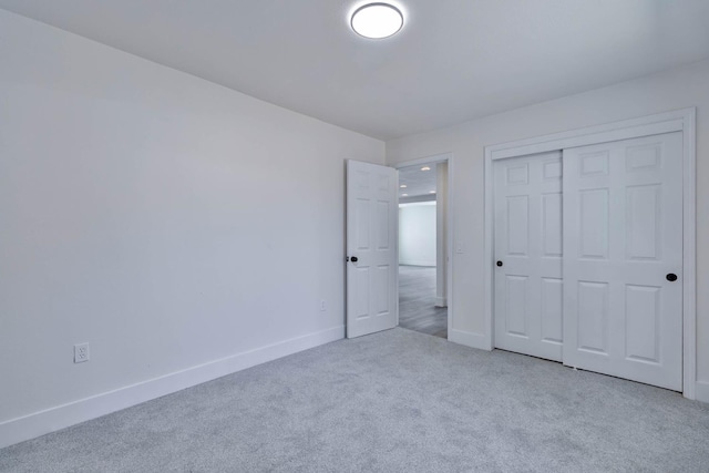 227 E Pine Ave, Fresno, CA 93728 - unfurnished bedroom with carpet, baseboards, and a closet