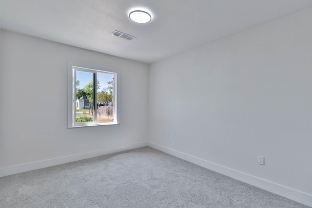227 E Pine Ave, Fresno, CA 93728 - unfurnished room featuring baseboards and carpet flooring