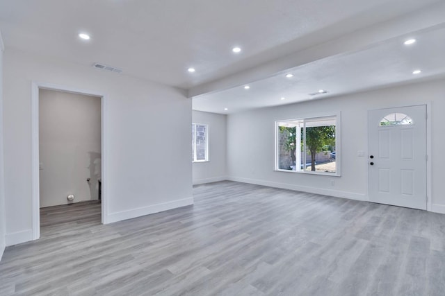 227 E Pine Ave, Fresno, CA 93728 - unfurnished living room with light wood-style flooring, recessed lighting, and baseboards