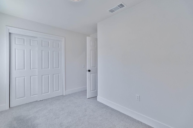 227 E Pine Ave, Fresno, CA 93728 - unfurnished bedroom with carpet flooring, baseboards, and a closet