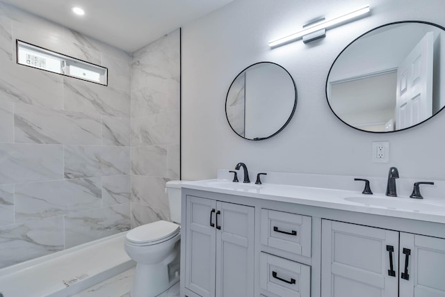 227 E Pine Ave, Fresno, CA 93728 - bathroom featuring marble finish flooring, double vanity, toilet, and a tile shower