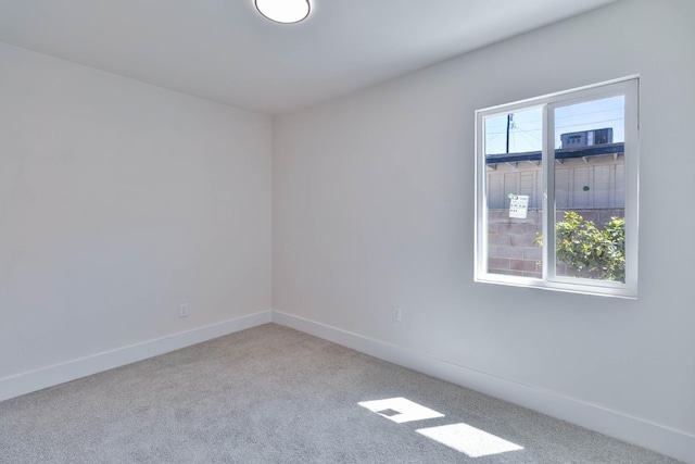 227 E Pine Ave, Fresno, CA 93728 - empty room with baseboards and carpet