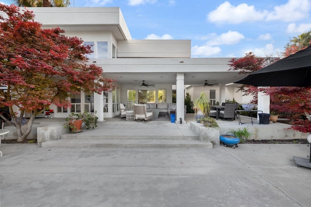 view of patio featuring outdoor lounge area, outdoor dining space, and ceiling fan