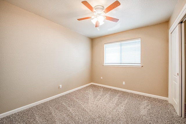 5711 W Fallon Ave, Fresno, CA 93722 - unfurnished bedroom with baseboards, carpet floors, ceiling fan, and a closet