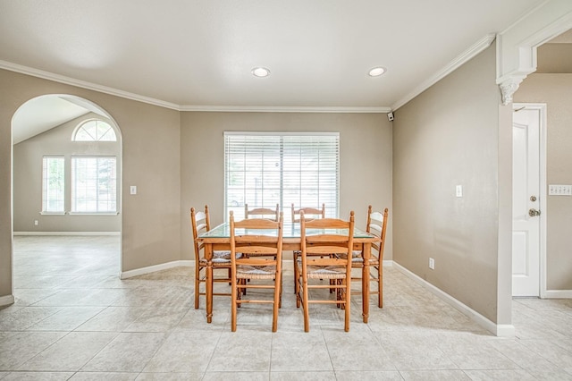 5711 W Fallon Ave, Fresno, CA 93722 - dining room with arched walkways, crown molding, and baseboards