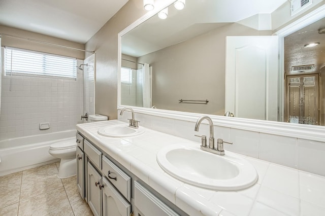 5711 W Fallon Ave, Fresno, CA 93722 - full bathroom with shower / tub combination, toilet, a sink, and visible vents