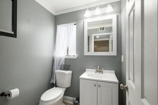 3375 N Berlin Ave, Fresno, CA 93722 - bathroom with toilet, baseboards, visible vents, vanity, and ornamental molding