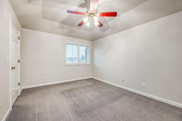 unfurnished room featuring visible vents, baseboards, a ceiling fan, and carpet flooring