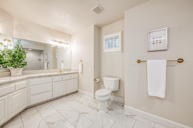 full bathroom featuring visible vents, marble finish floor, vanity, and toilet