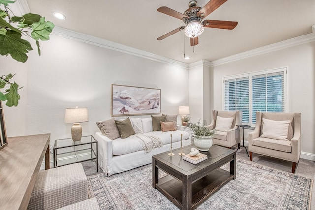 living area featuring ceiling fan, baseboards, ornamental molding, and recessed lighting