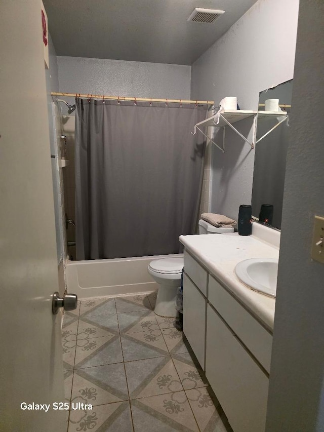 21754 California, San Joaquin, CA 93660 - full bathroom featuring visible vents, vanity, a textured wall, shower / bath combo with shower curtain, and tile patterned floors