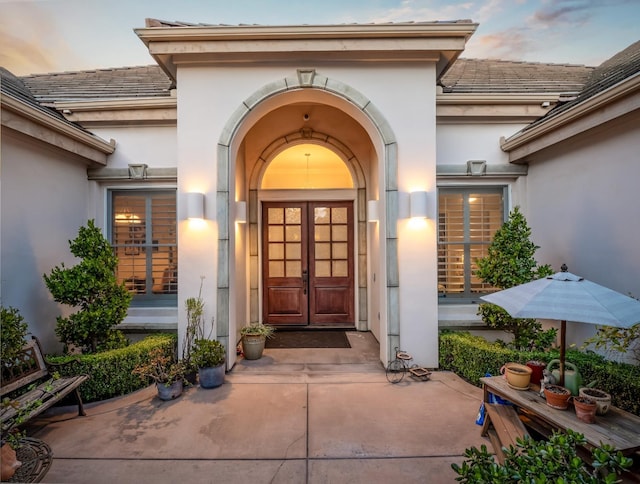 10640 N Old Course Dr, Fresno, CA 93730 - property entrance with stucco siding and a tile roof