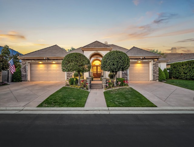 10640 N Old Course Dr, Fresno, CA 93730 - ranch-style home with a tile roof, a lawn, stone siding, and concrete driveway