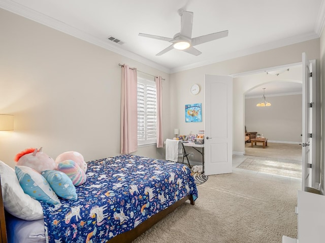 10640 N Old Course Dr, Fresno, CA 93730 - carpeted bedroom featuring a ceiling fan, visible vents, arched walkways, and crown molding
