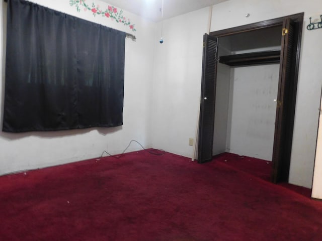 unfurnished bedroom featuring carpet flooring