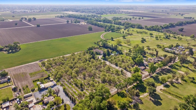 birds eye view of property featuring a rural view