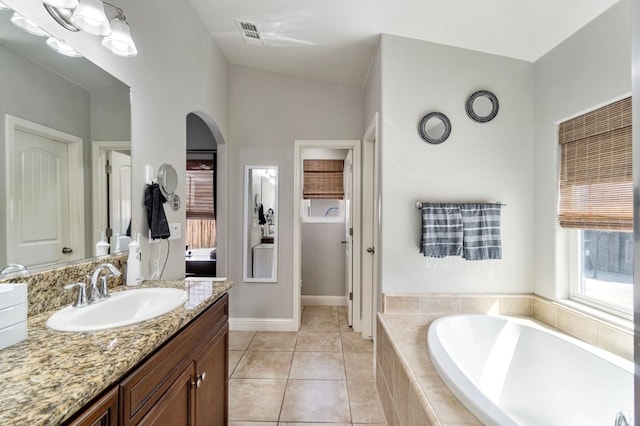full bath with a bath, visible vents, tile patterned flooring, and vanity