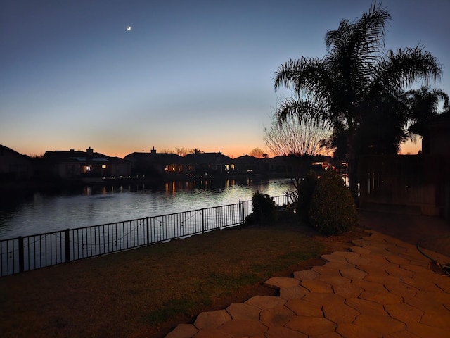 view of water feature with a fenced backyard