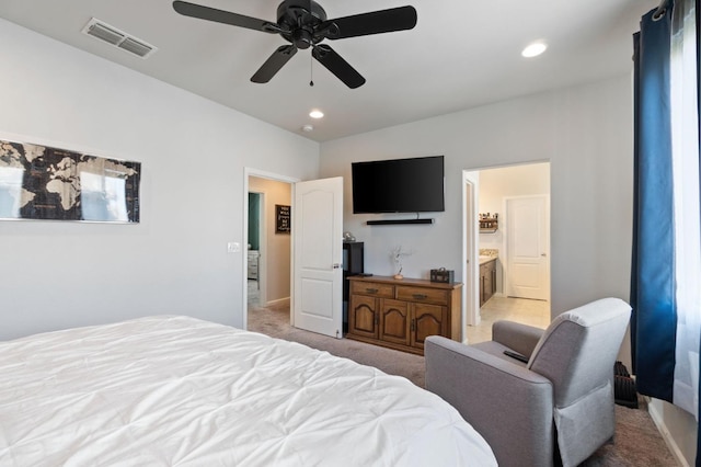 bedroom featuring light carpet, recessed lighting, a ceiling fan, connected bathroom, and baseboards