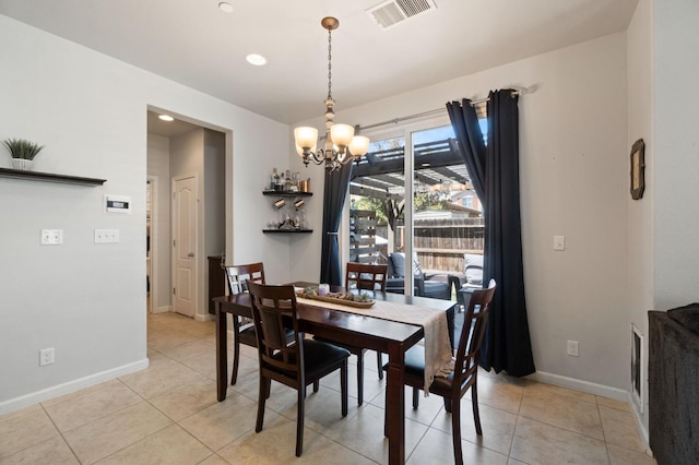 dining room featuring a chandelier, baseboards, light tile patterned floors, and recessed lighting