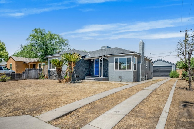 4731 E Laurel Ave, Fresno, CA 93702 - bungalow featuring fence, stucco siding, driveway, a chimney, and a garage