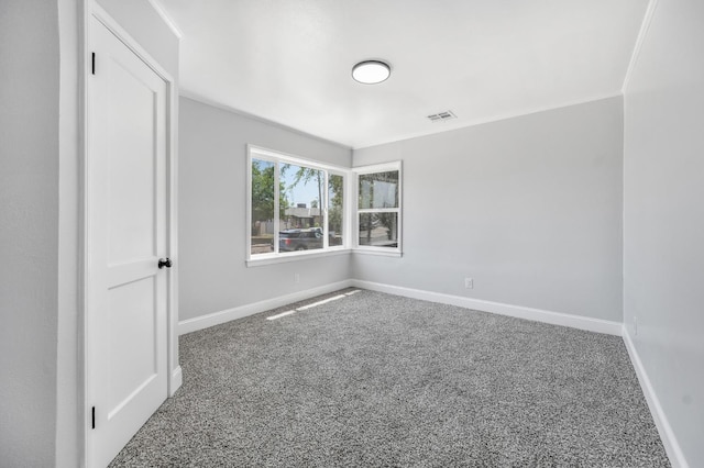 4731 E Laurel Ave, Fresno, CA 93702 - spare room with baseboards and carpet floors