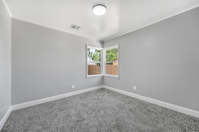 4731 E Laurel Ave, Fresno, CA 93702 - carpeted empty room featuring crown molding and baseboards