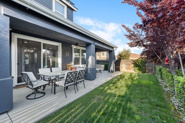 view of yard with a fenced backyard, a ceiling fan, a patio, and outdoor lounge area