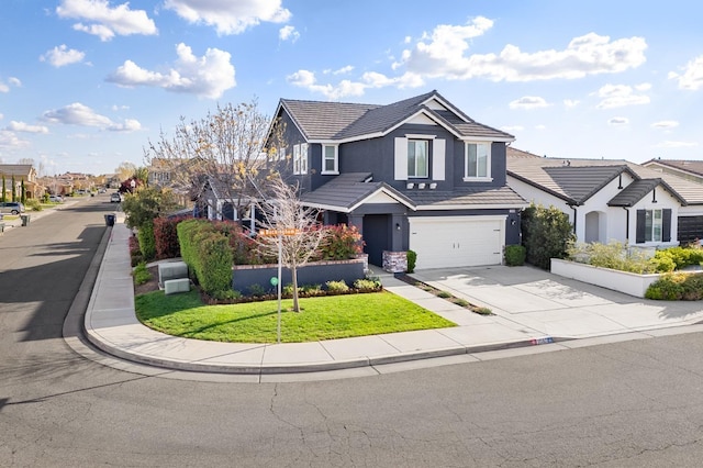 traditional home with a residential view, a garage, stucco siding, a tiled roof, and driveway