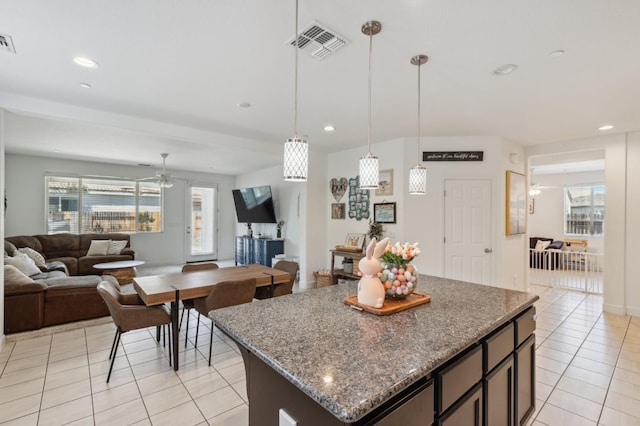 3821 Leigh Ln, Clovis, CA 93619 - kitchen with recessed lighting, visible vents, light tile patterned floors, open floor plan, and ceiling fan