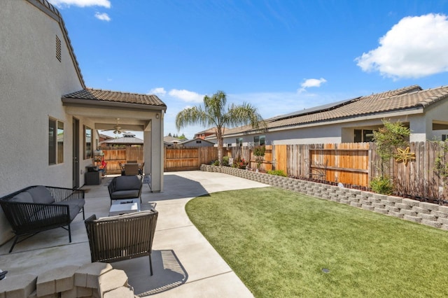 3821 Leigh Ln, Clovis, CA 93619 - view of yard with a fenced backyard, a patio, ceiling fan, and an outdoor hangout area