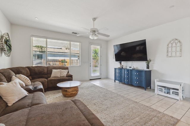 3821 Leigh Ln, Clovis, CA 93619 - living area featuring ceiling fan, baseboards, light tile patterned flooring, and visible vents