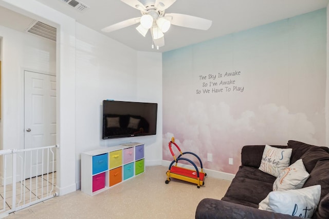 3821 Leigh Ln, Clovis, CA 93619 - living area with baseboards, visible vents, and ceiling fan