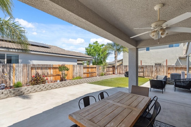 3821 Leigh Ln, Clovis, CA 93619 - view of patio / terrace with a ceiling fan, outdoor dining area, and a fenced backyard