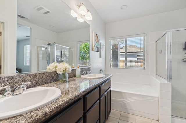 3821 Leigh Ln, Clovis, CA 93619 - full bath featuring a sink, visible vents, and a stall shower
