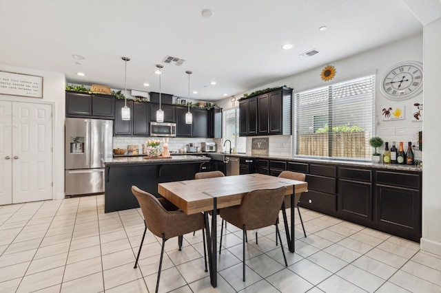 3821 Leigh Ln, Clovis, CA 93619 - dining space featuring light tile patterned flooring, visible vents, and recessed lighting