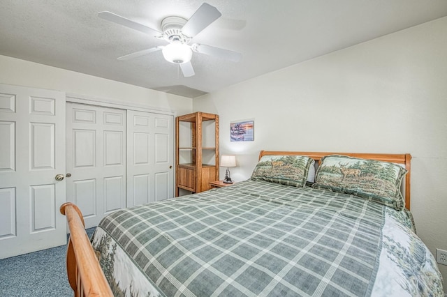42153 Hemlock Ln, Shaver Lake, CA 93664 - bedroom with carpet, a closet, and a ceiling fan