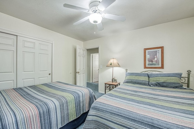 42153 Hemlock Ln, Shaver Lake, CA 93664 - bedroom with carpet, a closet, and a ceiling fan