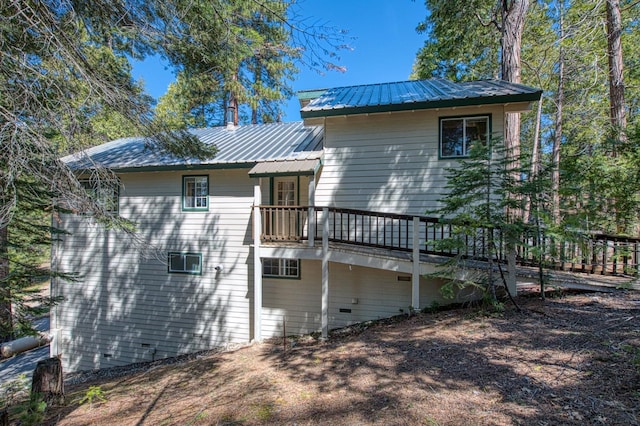 42153 Hemlock Ln, Shaver Lake, CA 93664 - back of house with metal roof and a wooden deck