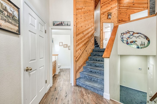 42153 Hemlock Ln, Shaver Lake, CA 93664 - stairway with wood finished floors and wooden walls