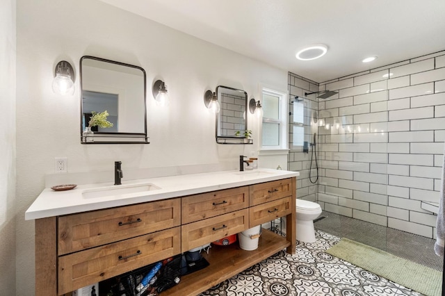 bathroom with walk in shower, a sink, double vanity, and toilet