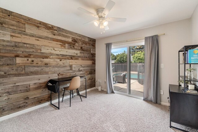 340 W Escalon Ave, Fresno, CA 93704 - office featuring wooden walls, a ceiling fan, and carpet