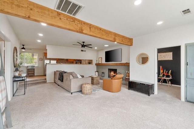 340 W Escalon Ave, Fresno, CA 93704 - carpeted living area featuring a ceiling fan, recessed lighting, beam ceiling, and a brick fireplace