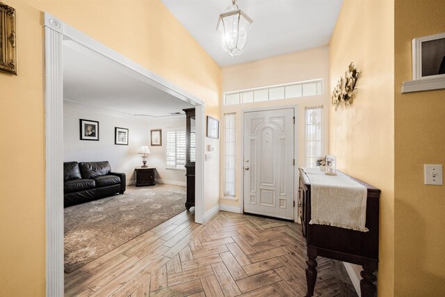 foyer entrance with baseboards