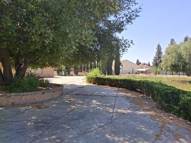 surrounding community featuring fence